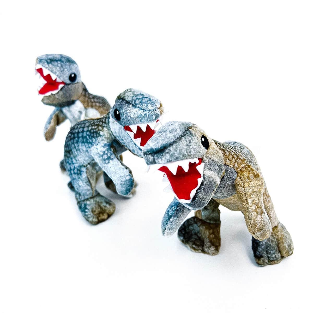 https://www.boogsboop.com/cdn/shop/products/dinosaur-borrow-dog-toy-min.jpg?v=1675967332&width=1445